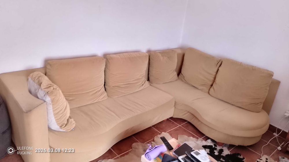 Sofá em L com almofada de penas