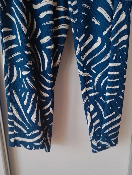 Materiałowe spodnie damskie H&M rozm.50