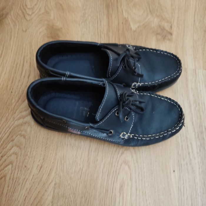 Sapatos de vela em pele como novos