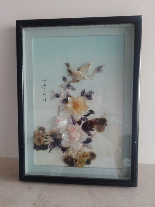 Bonito quadro em madeira e conchas