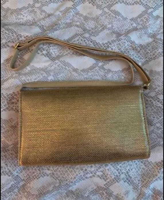 Clutch dourada nova
