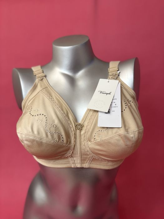 Solidny biutonosz Triumph mocno trzyma bezowy kremowy 75E