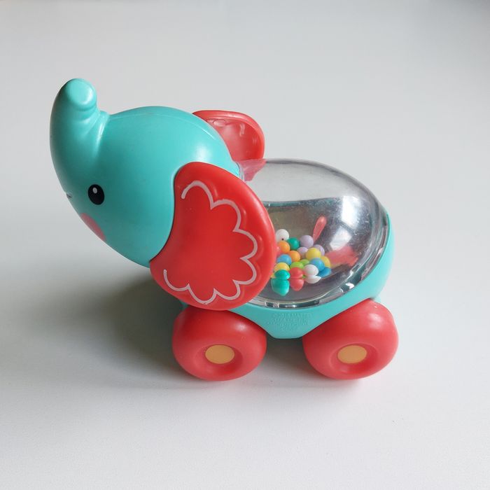 Grzechotka jeżdżące zwierzątka słonik z kulkami Fisher Price