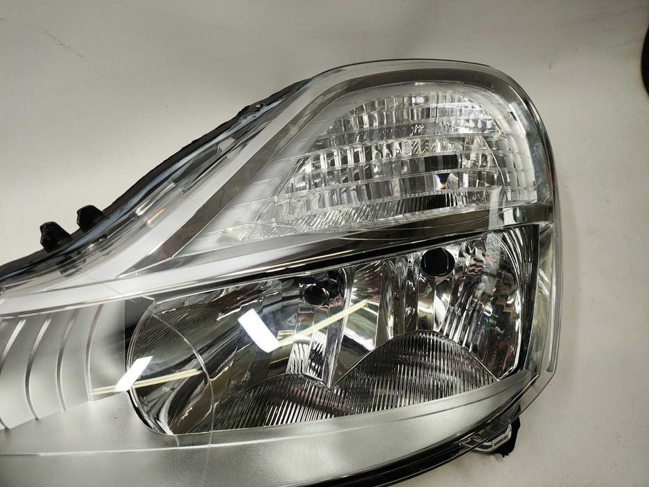 Lampa lewa przód przednia Renault Modus H7 H1 oryginał NOWA