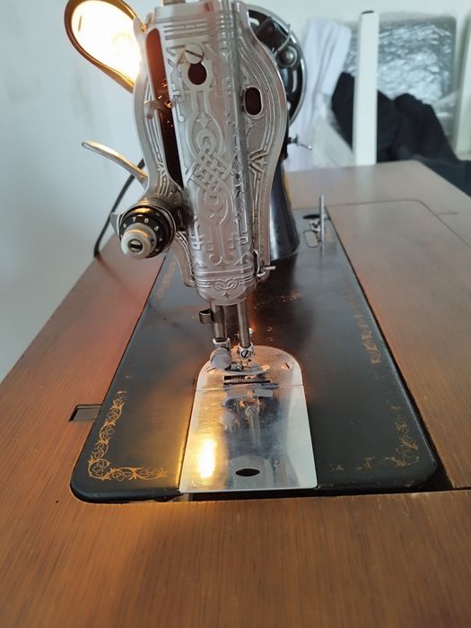 Máquina de costura singer