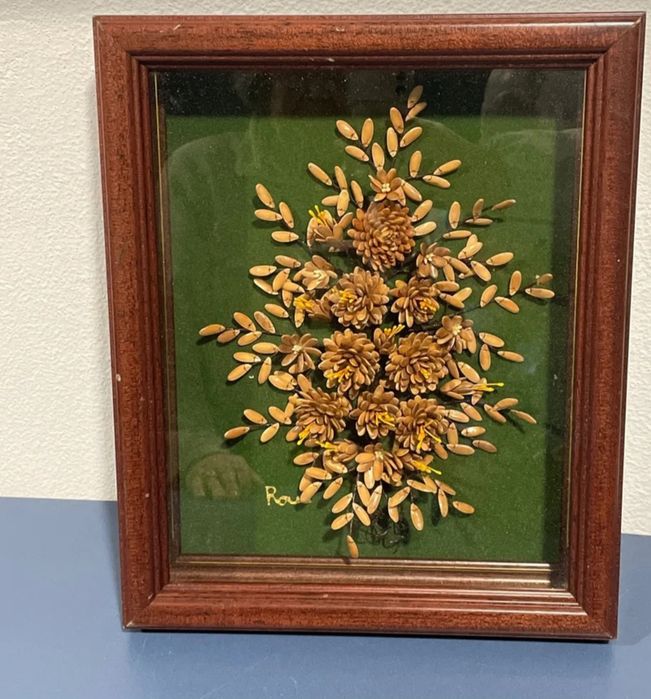 Quadro  decorativo feito à mão, com sementes de melão.