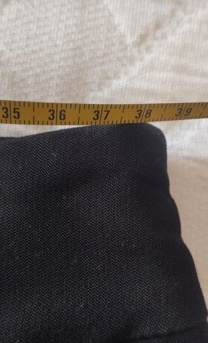 Colete pelo e mini saia preta