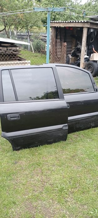 Двері opel zafira a балка та інші речі