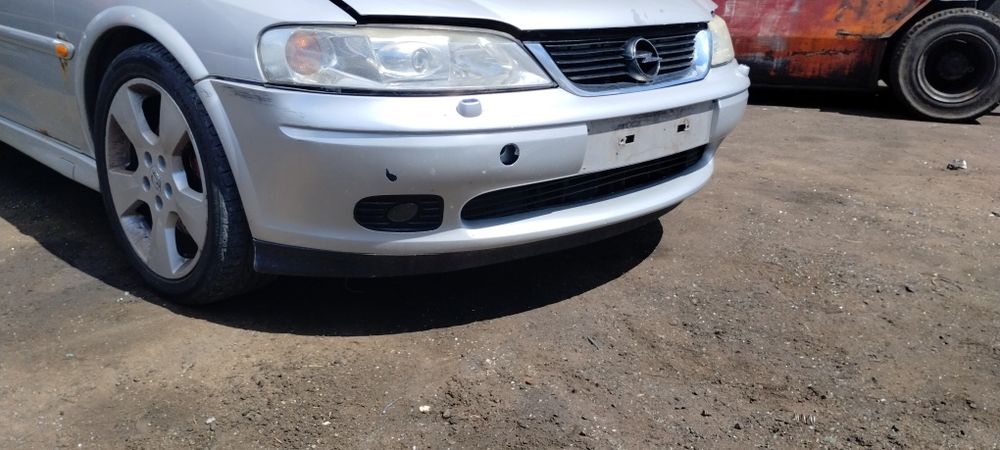 Opel Vectra b zderzak przód przedni że spryskiwaczami do Xenon