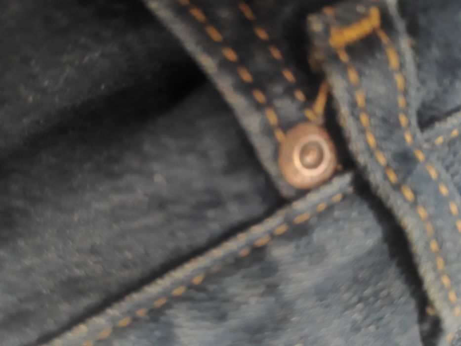 Jeansy Wrangler broken twill