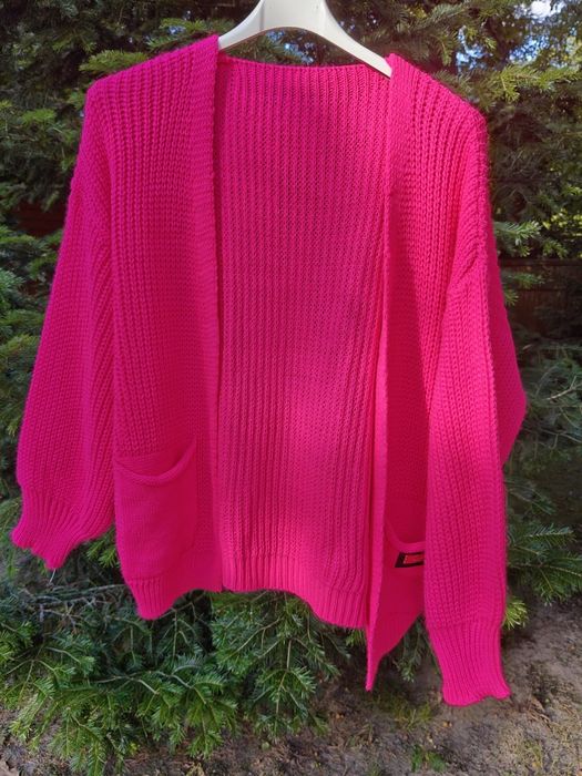 Nowy sweter damski z kieszeniami