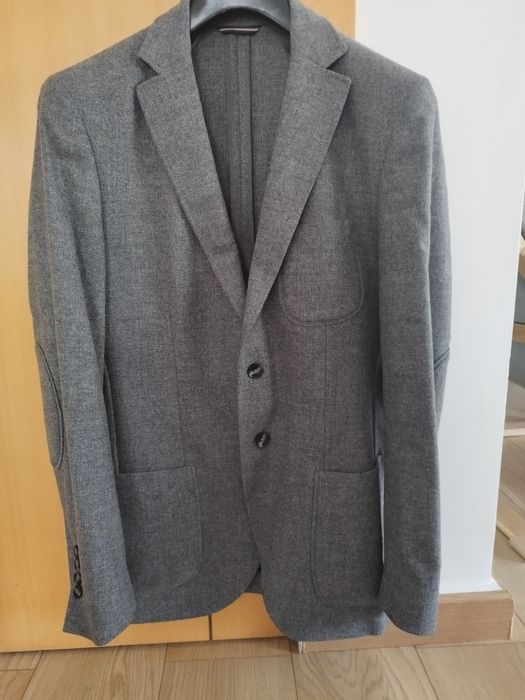 Vende se blazer cinza cintado de homem