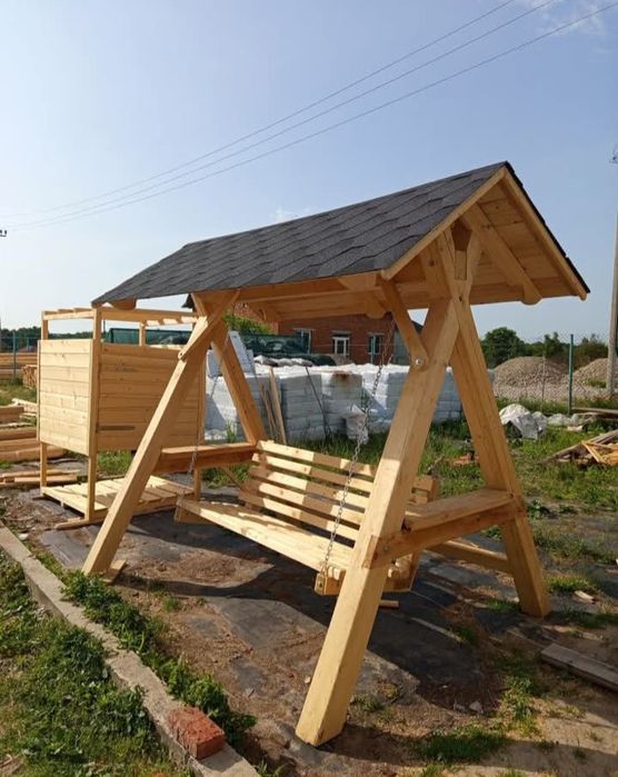 Альтанки гойдалки тераси дитячі майданчики вироби з дерева