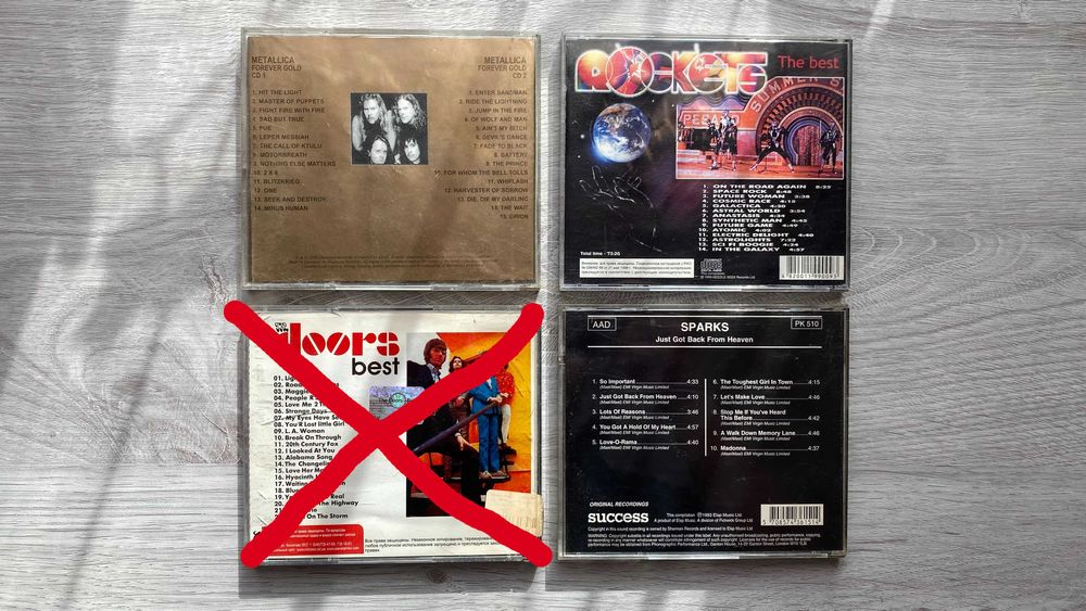 CD диски Metallica, Rockets, Sparks