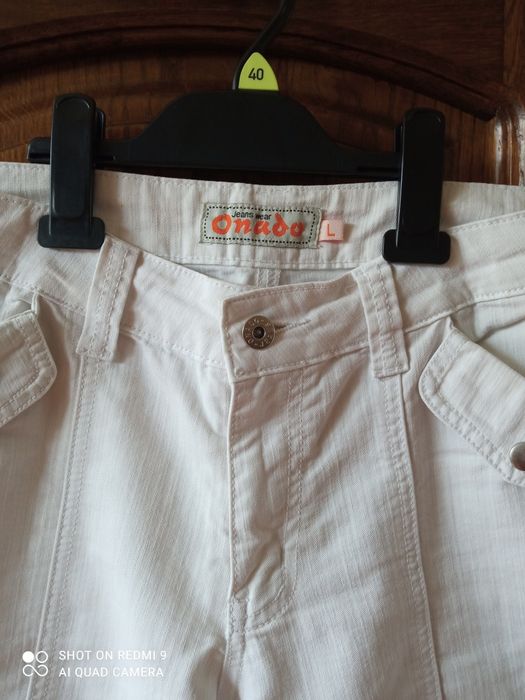 Spodenki jeansowe damskie za kolano M/L