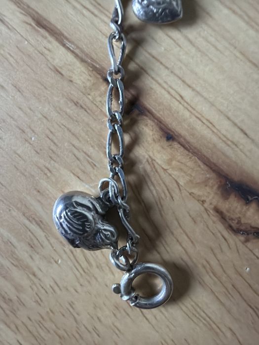 Pulseira com berlocos de prata