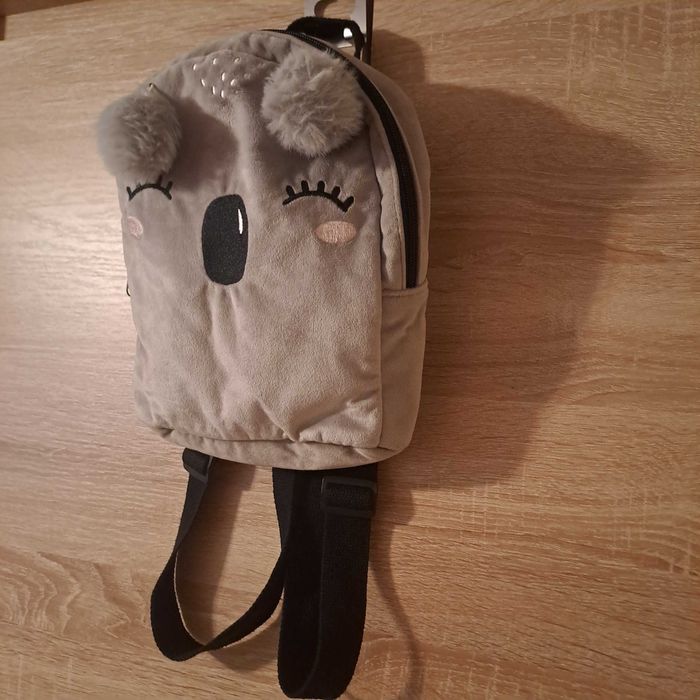 Plecak koala z pomponami szary Reserved