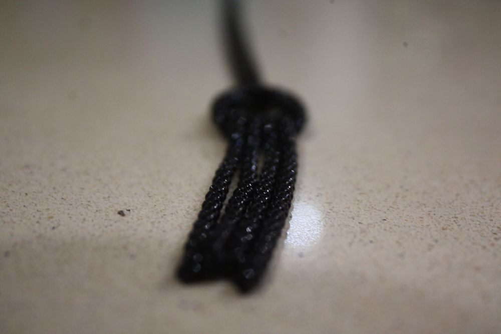 Colar preto miçangas