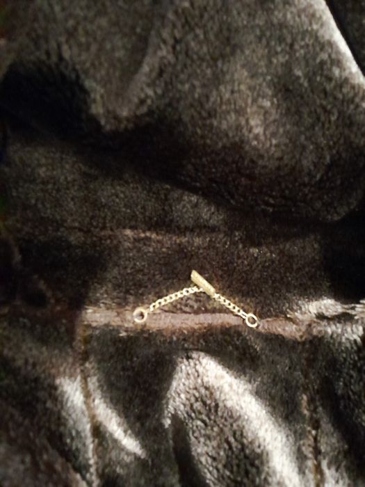 Нова не ношена фірмова дублянка із капішоном