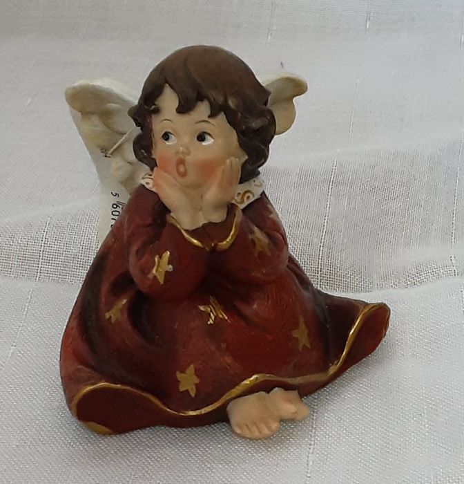 Anjinhos em marfinite