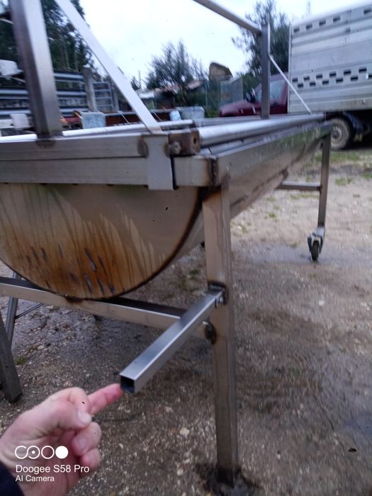 Assador porco no espeto