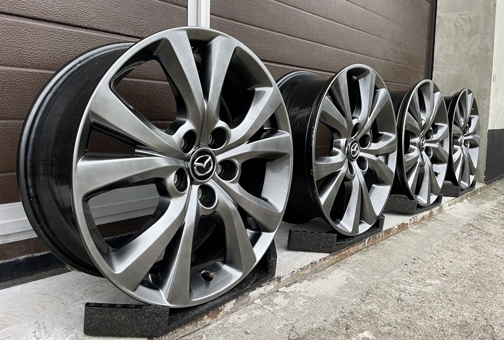 4x felgi aluminiowe 5x114,3 r18 et45 7J Alufelgi Oryginał Mazda Grafit