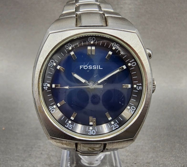 Fossil Blue AM-3604 зі сталевим браслетом та синім циферблатом.