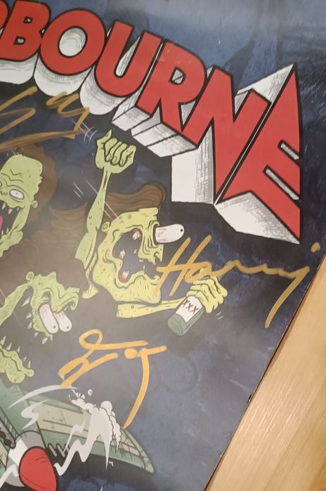 Plakat Airbourne z podpisami całego zespołu