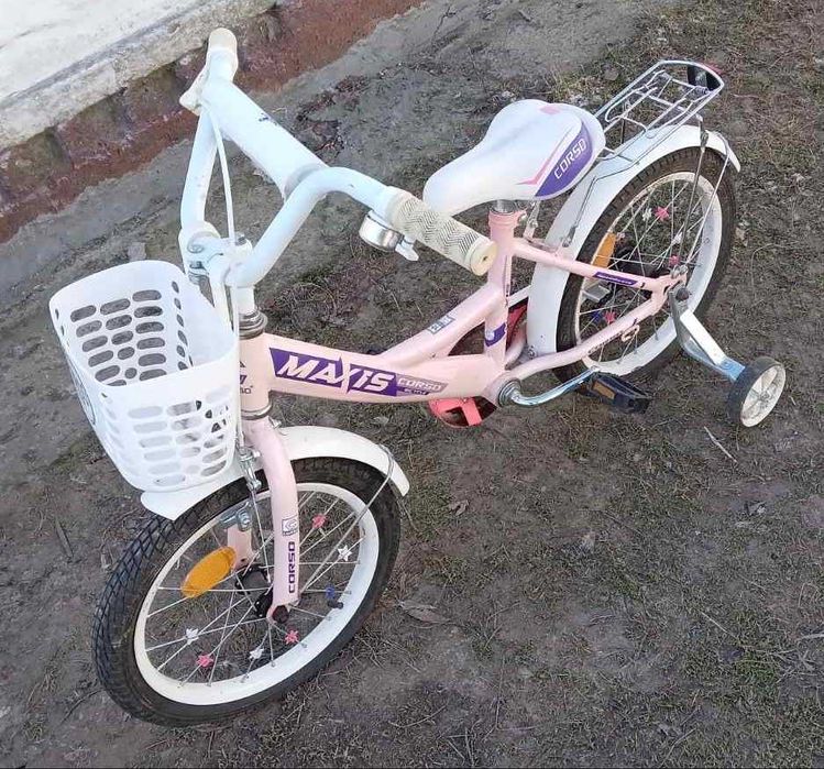 Велосипед для дівчинки на 5-9 років. Дуже зручний додаткові колеса.