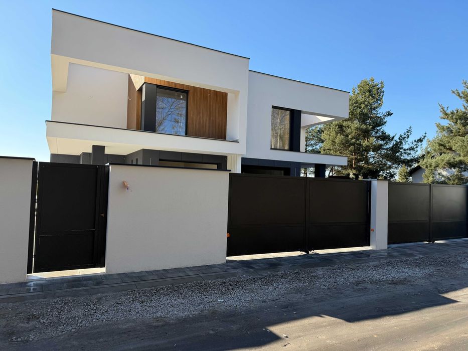 Nowoczesne domy w zabudowie bliźniaczej w miejscowości Wrzosów