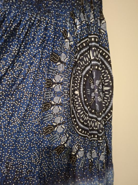 Vestido comprido ombro a ombro 
Elástico no tronco
Tamanho único