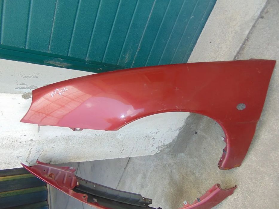 Mazda MX3 guarda lamas