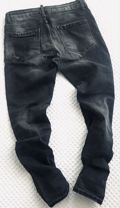 Spodnie jeansowe Dsquared2 dziury przecierane
