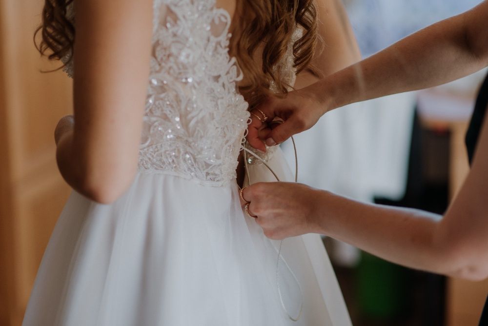 Suknia ślubna w idealnym stanie 36/38