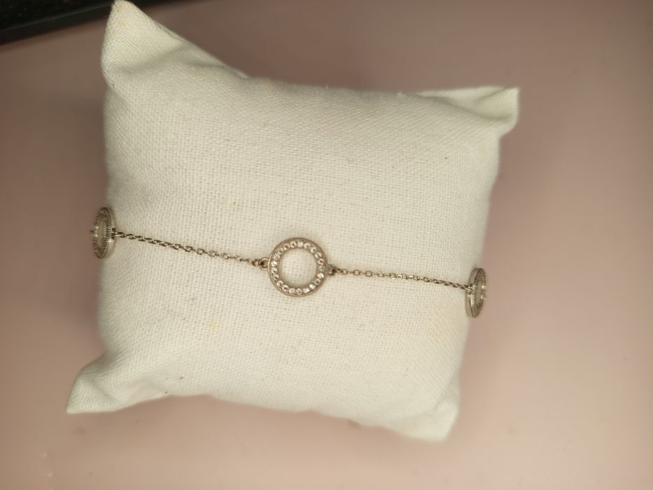 Srebrna bransoletka z kółkami i cyrkoniami
