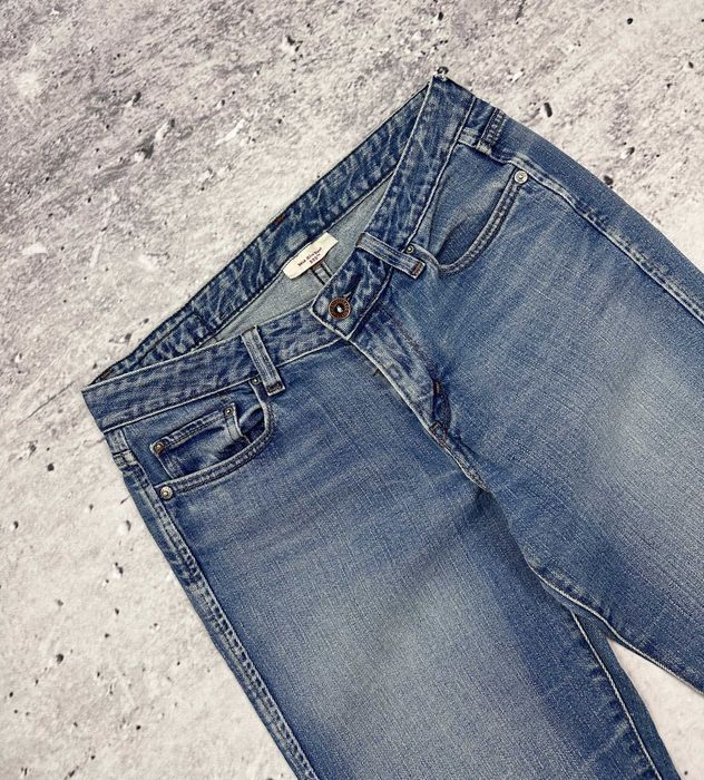 Spodnie jeansowe LEVIS 553 Mid-Rise Boot dzwony damskie szerokie W29