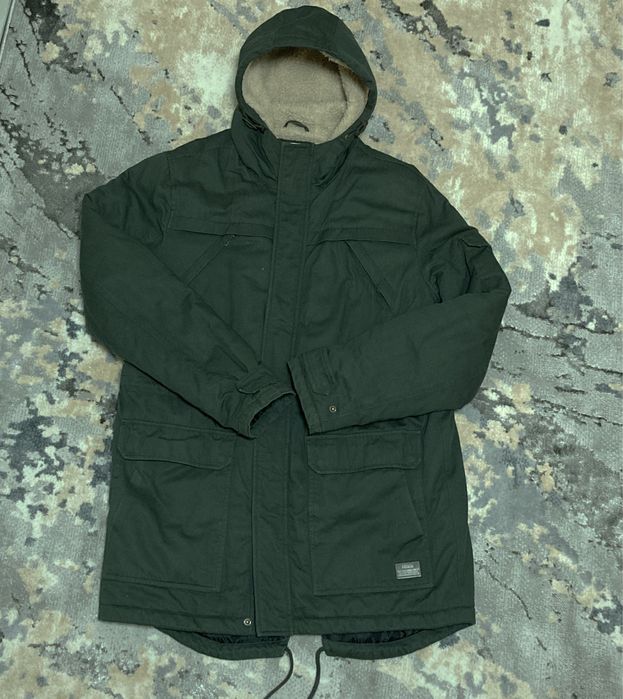 Зимова довга куртка