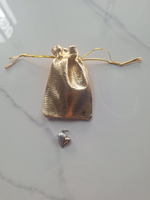 Złota zawieszka serce 333 diamentowane nacinane