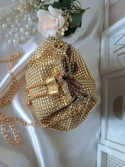 Złoty wizytowy plecaczek