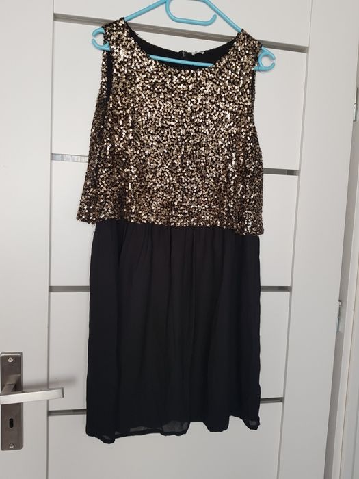 Sukienka z cekinami L/XL.