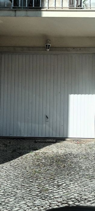 Portão de garagem em metal