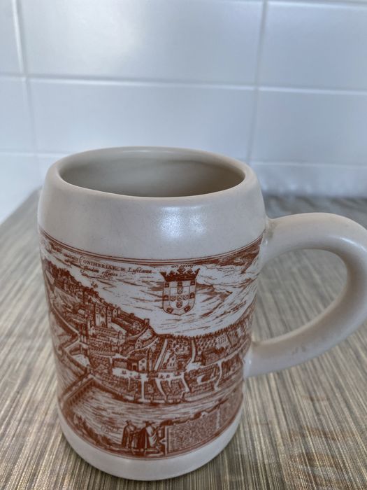 Very old vintage mug with badge