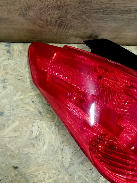 Peugeot 308 T7 hatchback lampa tył tylna prawa lewa oryginał wkład