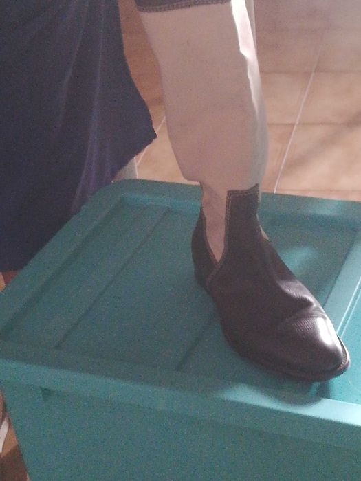 Botas altas pelo joelho