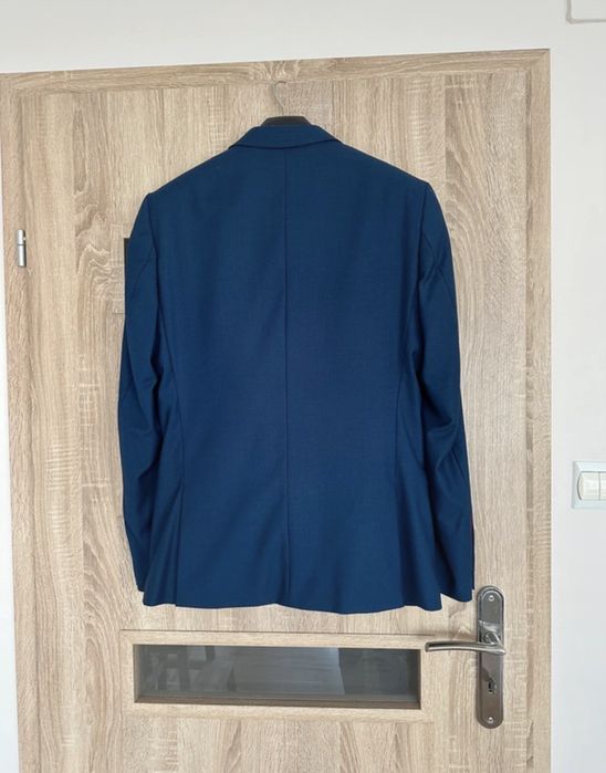 Garnitur męski młodzieżowy elegancki  granatowy  Wiliński