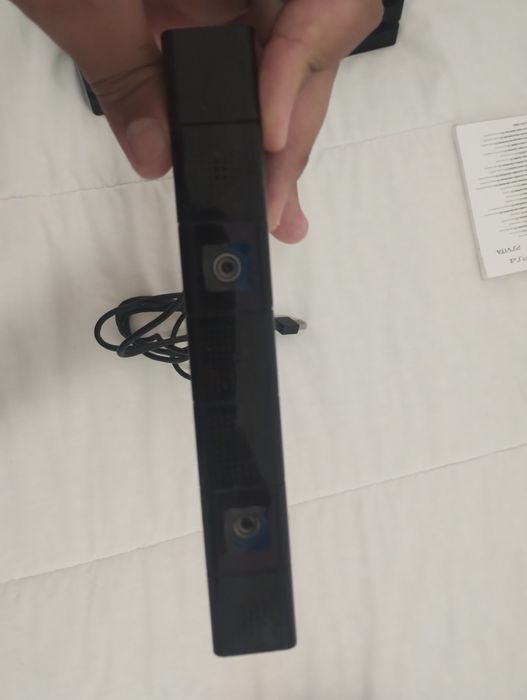 PS4 Pro + 12 Jogos + 2 Comandos + Câmara + Base de Carregamento