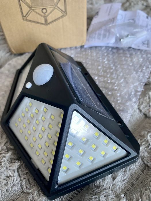 Ліхтар 100 LED на сонячній батареї з датчиком рухуЛампаБлекаут