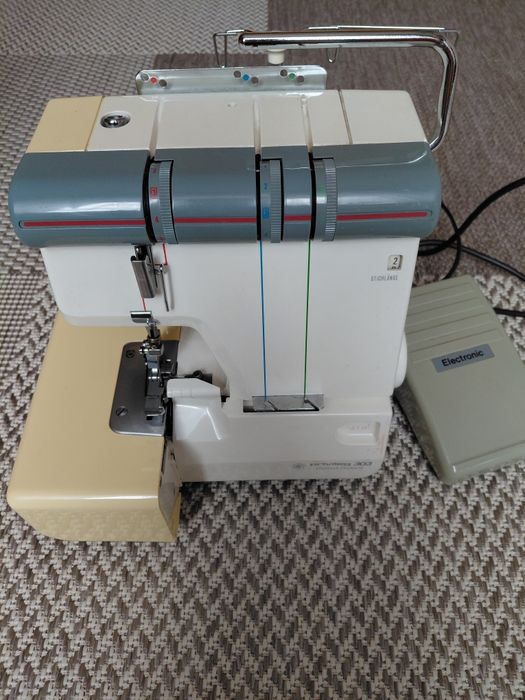 Оверлок privilege 303