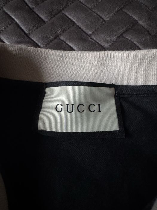 Поло Gucci.