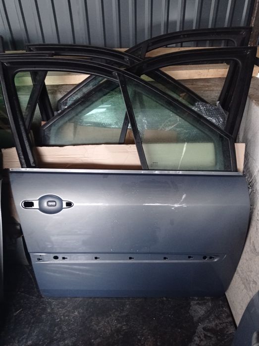 Двері ліві праві  передні задні TE266 renault scénic 2 ii 06- 10